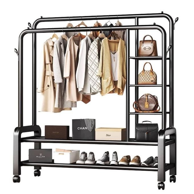 Metallic Clothes Organizer Rack With Integrated Shelving And Caster Wheels