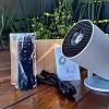 HY300 Mini Portable Smart Projector – 180° Adjustable Stand for Movies, Gaming & Presentations
