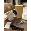 HY300 Mini Portable Smart Projector – 180° Adjustable Stand for Movies, Gaming & Presentations